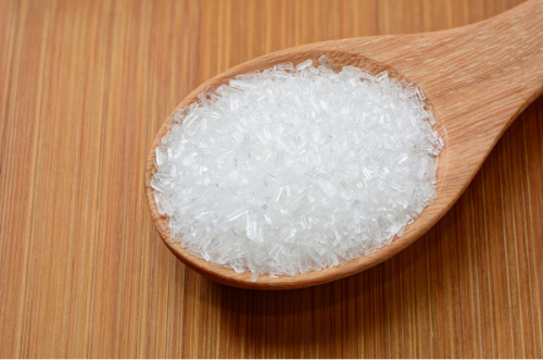 Monosodium glutamate (MSG) is a widely used flavor enhancer in food that boosts savory tastes. While it has faced health concerns, moderate use is generally considered safe.