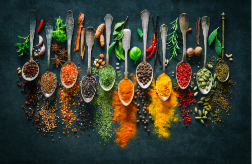 Enhance your homemade popsicles with spices and herbs like ginger for warmth, turmeric for color, cinnamon for comfort, cardamom for sweetness, and lavender for a floral note.