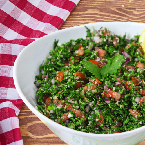 Fresh Lebanese Tabbouleh with bulgur, parsley, mint, tomatoes, lemon juice, and olive oil, perfect for plant-based diets in children.