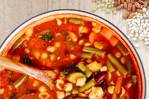 Italian Minestrone Soup filled with beans, pasta, and fresh vegetables, ideal for plant-based diets in children
