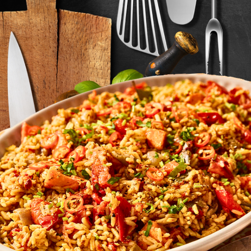 Jollof Rice featuring vibrant tomatoes, bell peppers, and spices, perfect for plant-based diets in children.