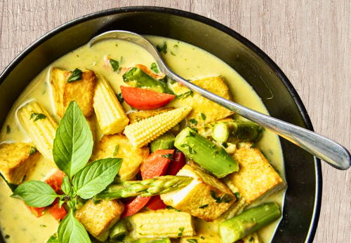Thai Green Curry with Tofu, a colorful and nutritious dish perfect for plant-based diets in children.